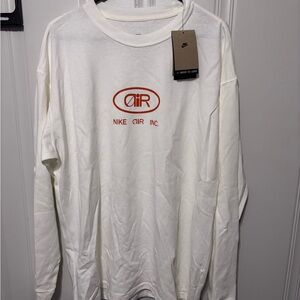Nike Air Inc. Men's Long-Sleeve Logo Tee in White with Red Orange Graphic
